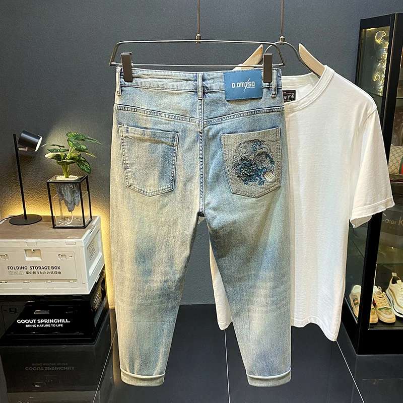 Fashionable high-end handsome jeans men's nine point 2025 summer thin embroidered slim fit trendy brand small foot casual pants