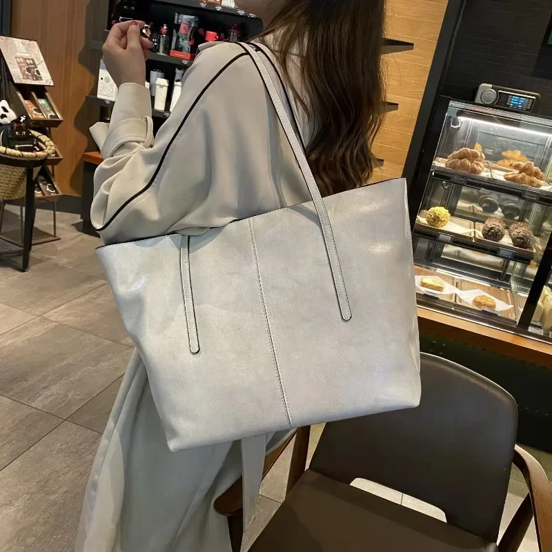 Bolsa de ombro de couro genuíno para mulheres, bolsa retrô de grande capacidade, bolsa versátil, estilo ocidental, bolsa requintada, tendência da moda, 2024