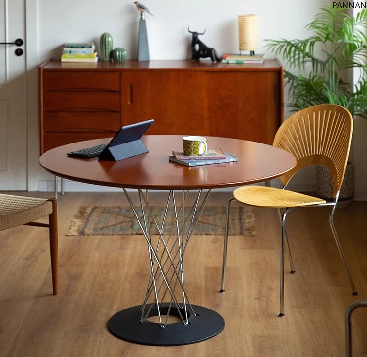 

Nordic Bauhaus solid wood round stainless steel high-end retro dining table coffee table