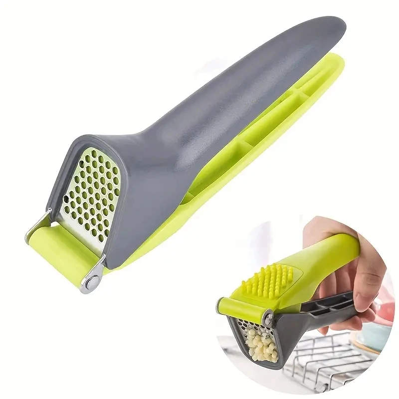 1 garlic press, a tool for crushing and squeezing garlic, a small household outdoor kitchen tool