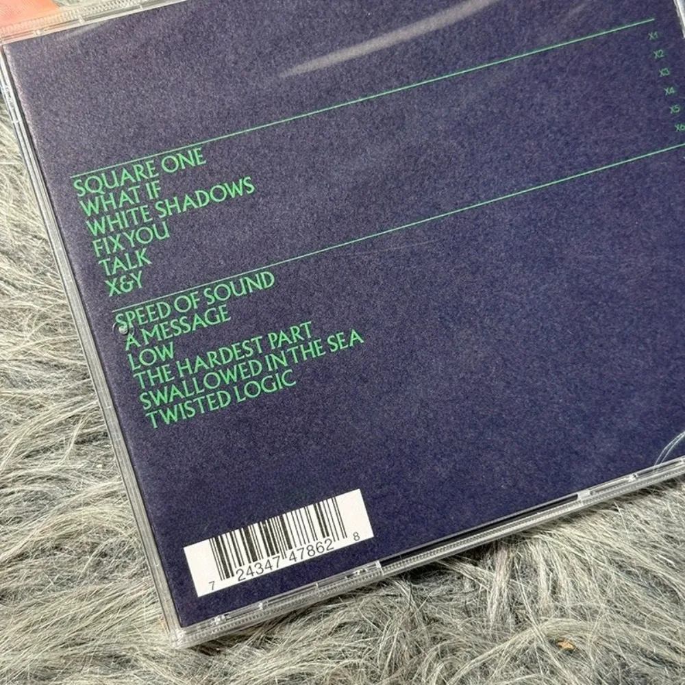 قرص مضغوط Coldplay X&Y النسخة الأوروبية - ألبوم روك بديل خالد مع غناء عاطفي للمعجبين والمجموعة