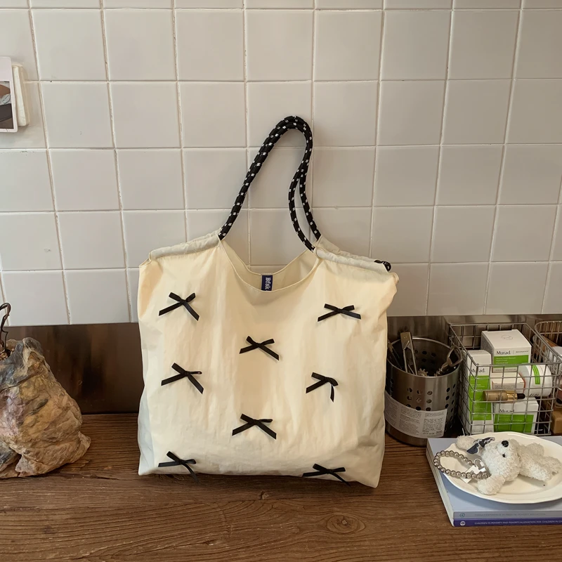 

Lightweight Nylon Shoulder Bags for Women 2026 New Fashion Sweet Elegant Concise Casual Large Capacity Commute Handbag