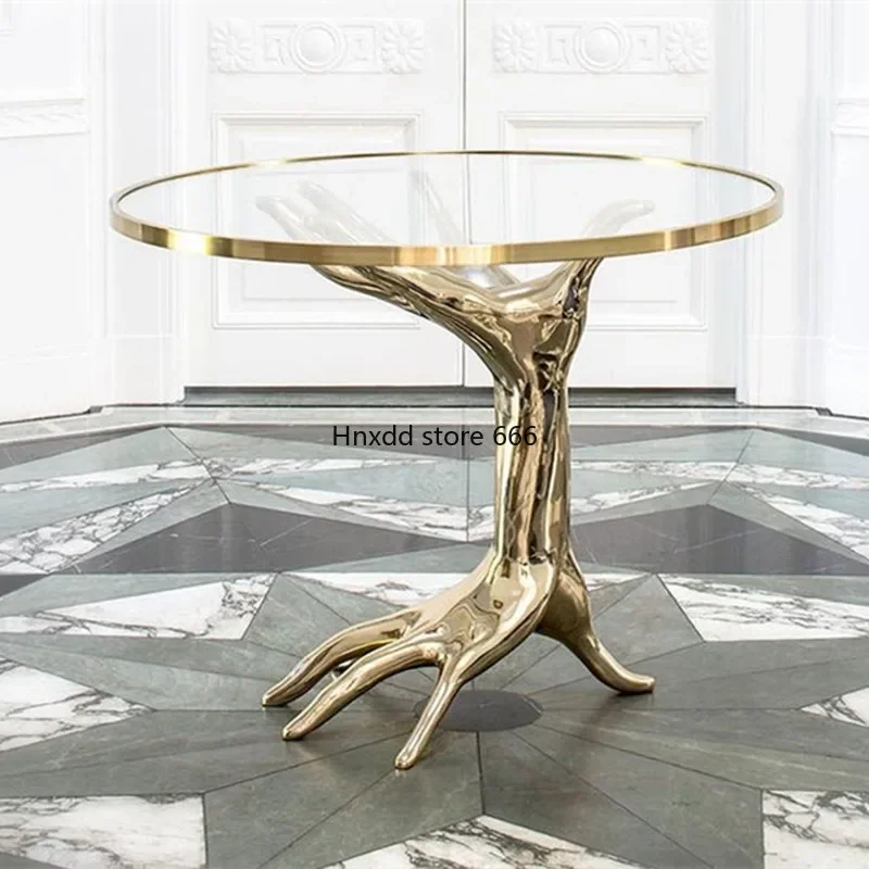 Coffee table art sculpture designer receives and negotiates round glass side table