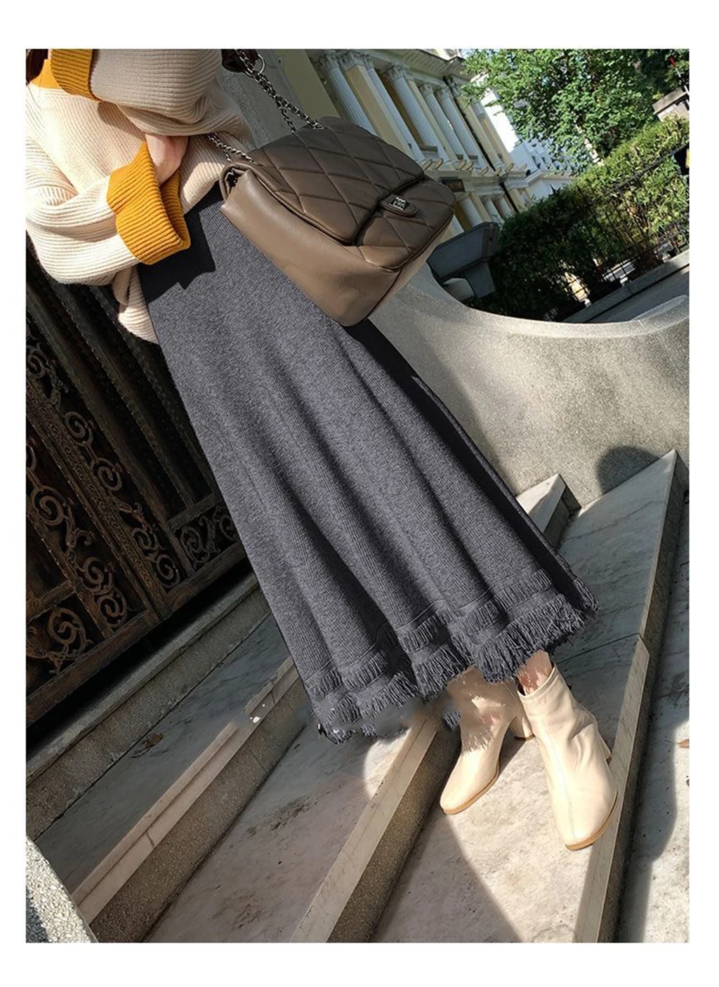 تنورة نسائية كلاسيكية للخريف جديدة بشراشيب صلبة من الصوف الكوري بخصر عالٍ مرنة متوسطة الطول تنورة محبوكة ضيقة على شكل حرف a