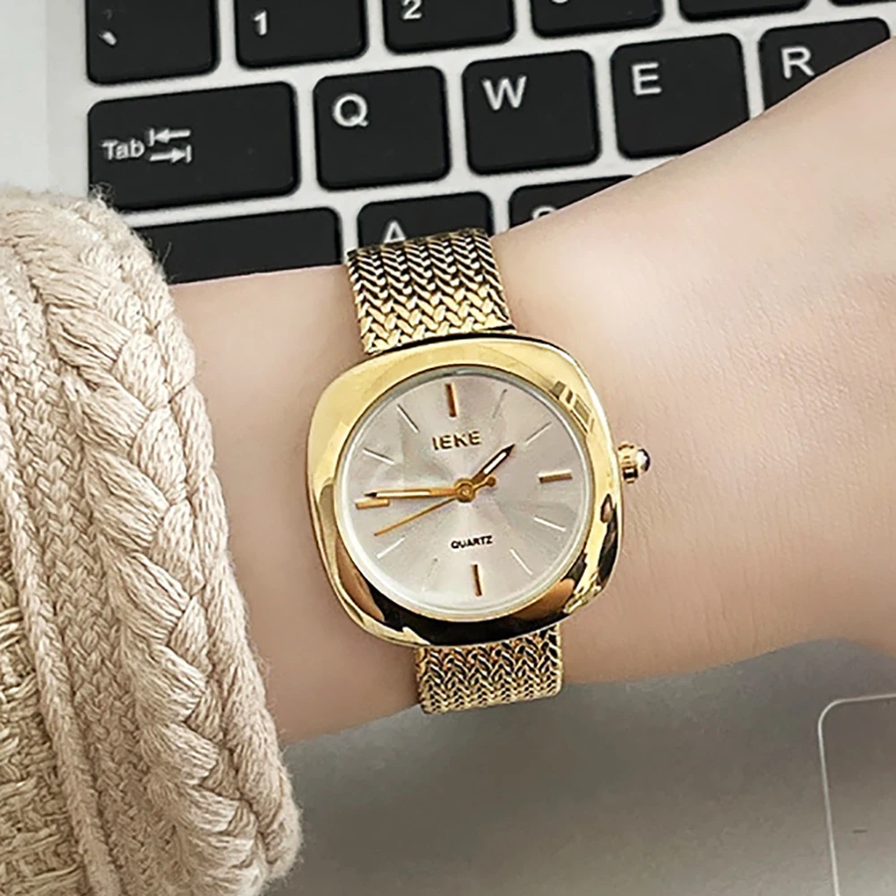 

New Woman watch Simple Square round Temperament Leisure Versatile montre stitch free shipping Fashion Quartz Women's watches