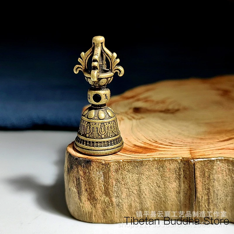 Niche Tibetan-style vintage brass Vajra bell pendant accessory with six-character mantra, Vajra bell charm, and decorative bead