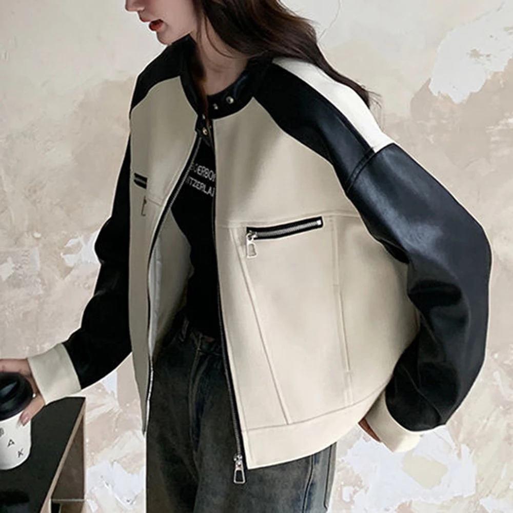 Cappotto con giunture in colore a contrasto in pelle PU bianca da donna primavera e autunno 2025 nuova piccola giacca corta da strada fritta retrò allentata