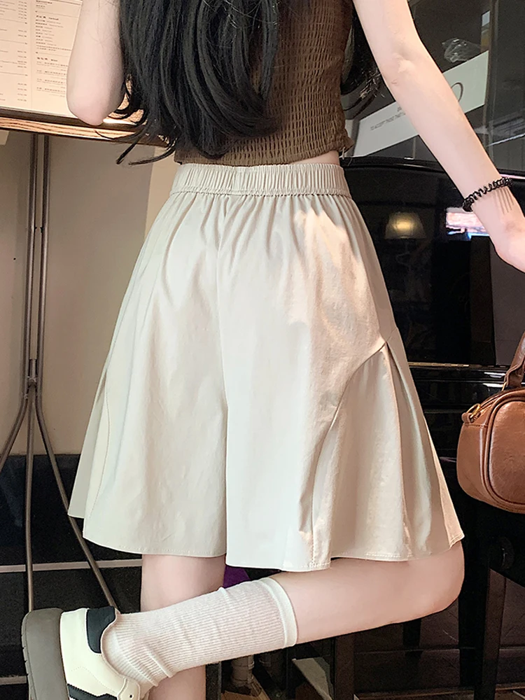 Pantalones cortos informales de Color liso para mujer, novedad de verano 2021, pantalones cortos holgados de cintura alta con pierna ancha y bolsillo