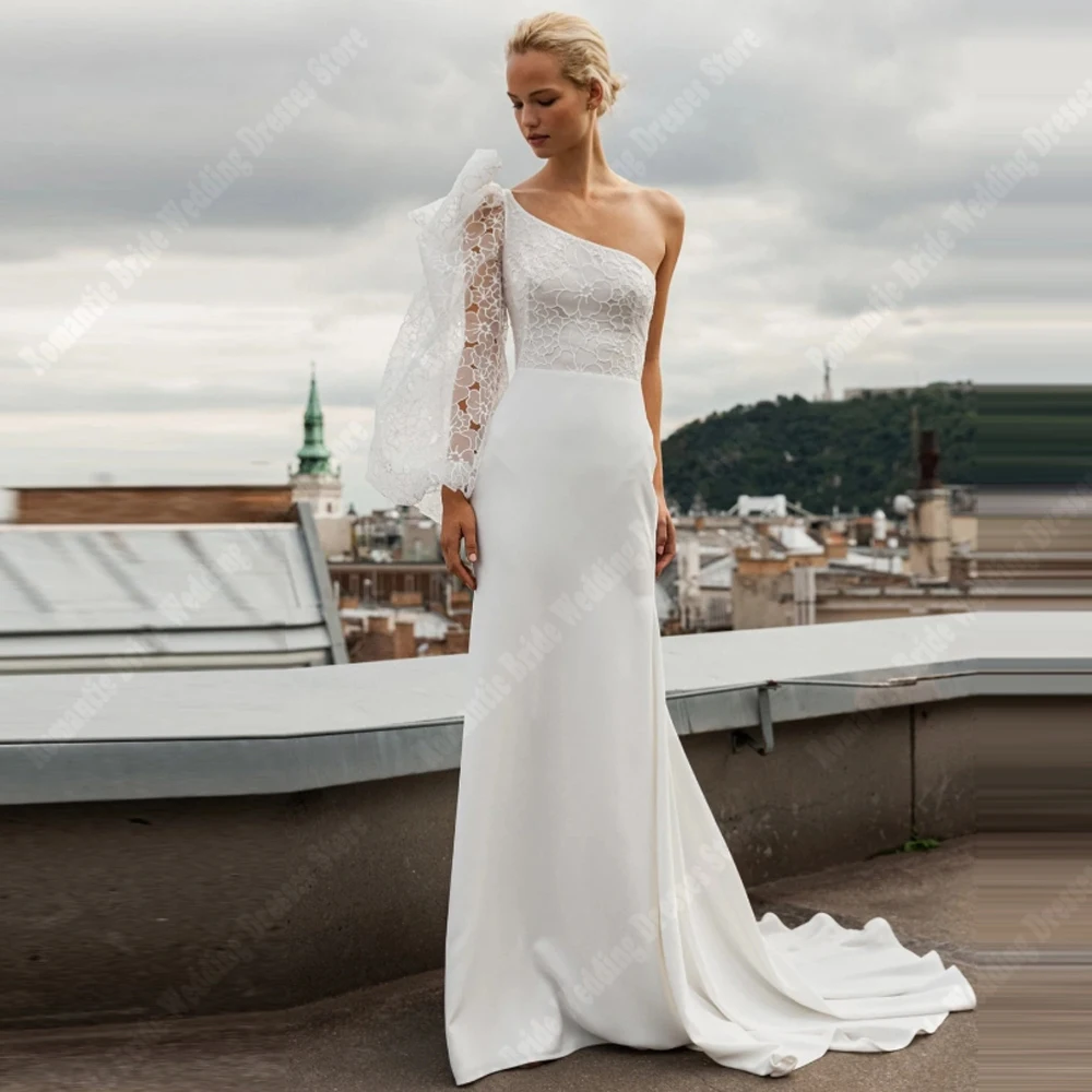 ชุดแต่งงานผู้หญิงแบบไหล่เดียวสุดเซ็กซี่ปี 2025 ชุดเจ้าสาวทรงเมอร์เมดหรูหรา ยาวลากพื้น สไตล์เจ้าหญิง  สามารถสั่งตัดได้