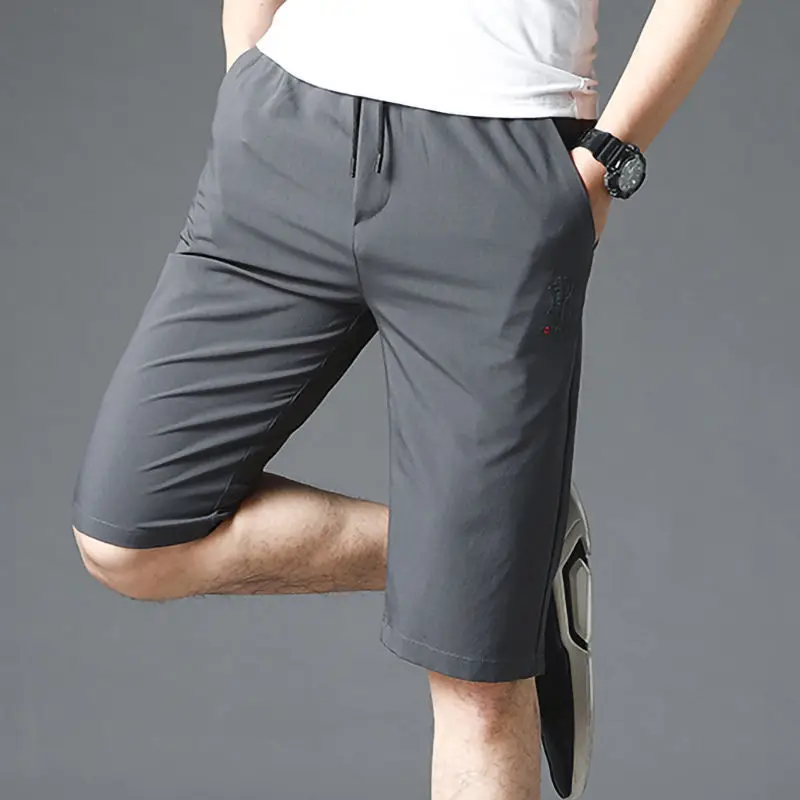 

Мужские повседневные свободные шорты с 5 точками, летняя новая стильная одежда, пляжные брюки с 7 точками для среднего возраста, спортивные брюки из ледяного шелка со средними рукавами