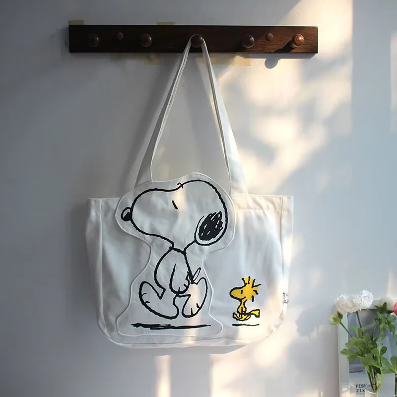 กระเป๋าผ้าใบผู้หญิงความจุสูงกระเป๋าแฟชั่นการ์ตูน Snoopy กระเป๋าถืออเนกประสงค์หนึ่งไหล่ Tote กระเป๋าเดินทางกระเป๋า