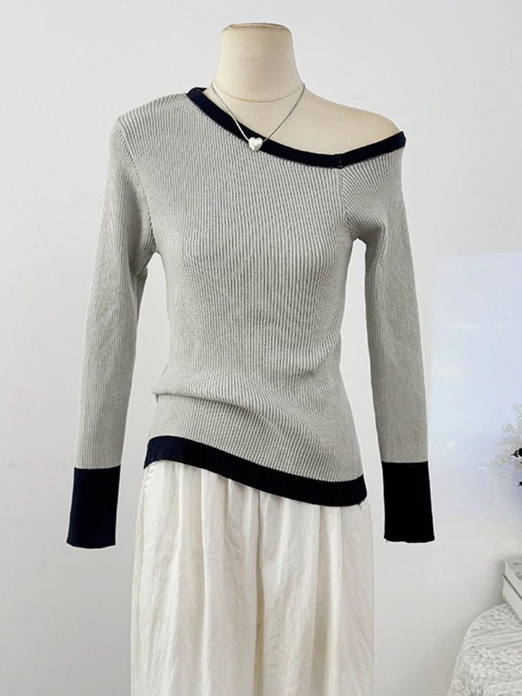 เสื้อแฟชั่นลำลองผู้หญิง ฤดูใบไม้ร่วง แบบเปิดไหล่ข้างเดียว ตัดสีแบบไม่สมมาตร เสื้อถักแขนยาว ทรงเข้ารูป สไตล์เรโทรเก๋ไก๋