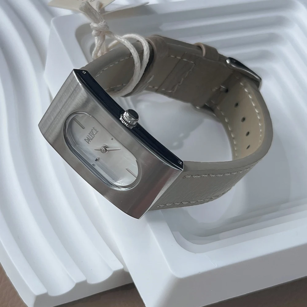 

Минималистичные нишевые женские часы с ремешком из натуральной кожи, элитные винтажные темпераментные элегантные женские кварцевые часы