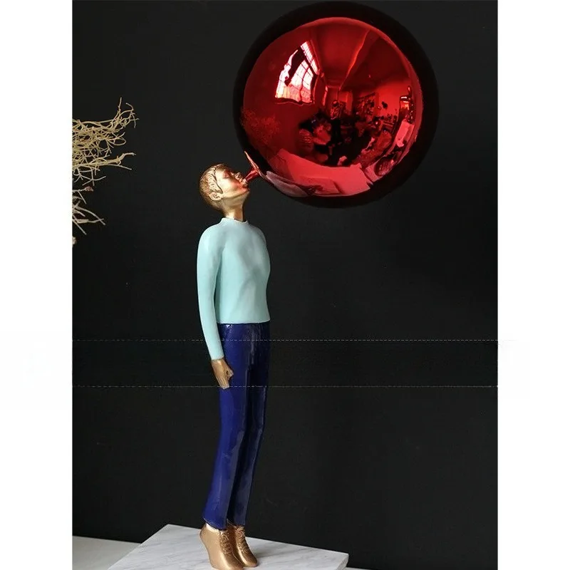 Light luxury modern resin balloon blowing boy decorative handicrafts, living room entrance character ornaments