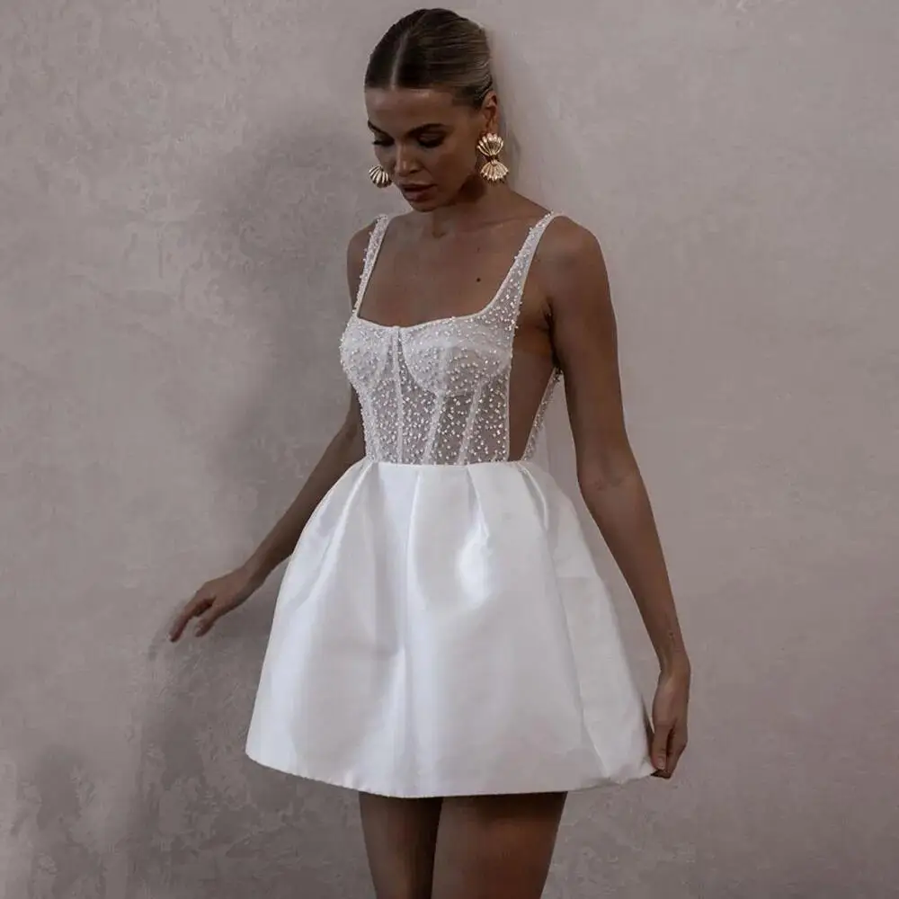 

RODDRSYA Spaghetti Straps Beads Pearls Sheer Corset Wedding Dress Sleeveless Short Backless Mini Bridal Gown Satin Party