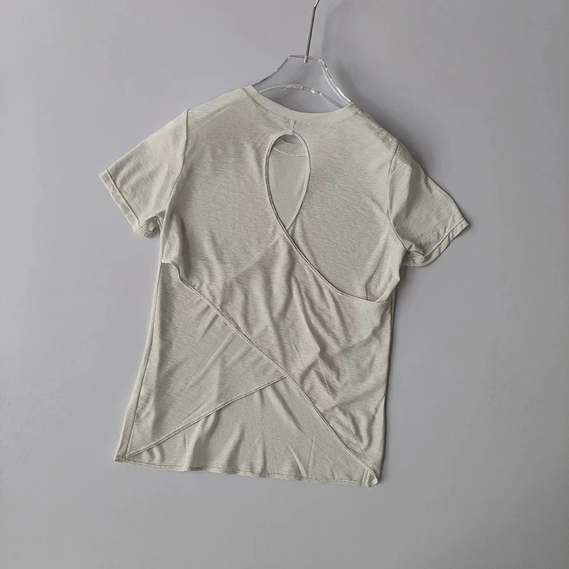 Damen Yoga-Überziehshirt mit strukturierter, kurzer Ärmelform, ausgestelltem Design, atmungsaktiv, schnelltrocknend, ideal für Pilates und Fitnessstudio. – Detail 31