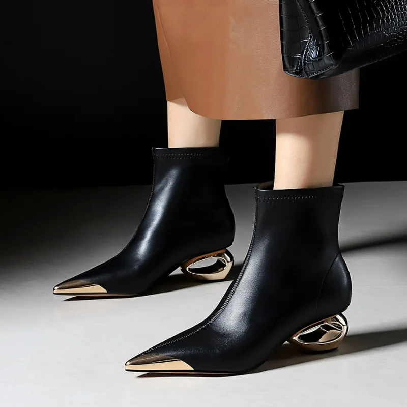 

2026 New Metal Hollow Heel Iron Head Metal Pointed Toes Modern Short Boots for Women Winter Street Style Low Heel Boots Female