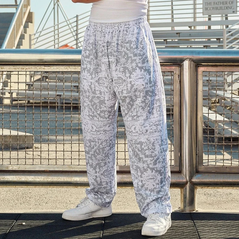 النمط الأمريكي الرجال Sweatpants أزياء الرجال الملابس الصيف تنفس التجفيف السريع فضفاض اللياقة البدنية عارضة السراويل المطبوعة الرقمية