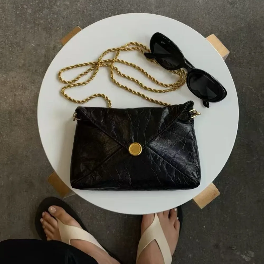 

Premium Leather Envelope One Shoulder Oblique Span Chain Gold Coin Bag, Leather Women's Bag, Simple Texture, Unique Fashionable
