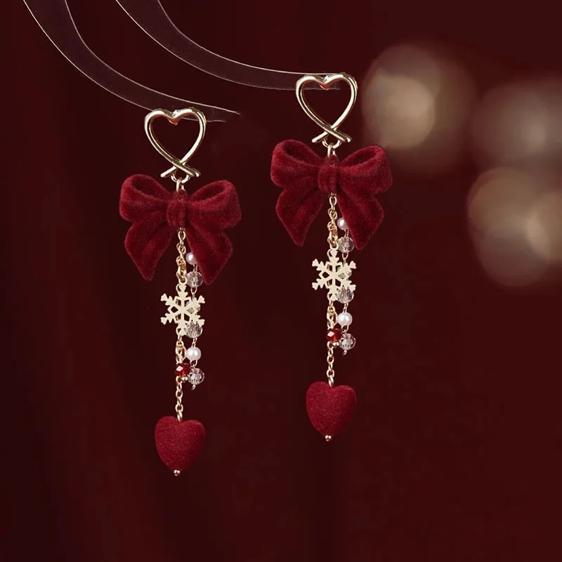 الأحمر توافدوا Bowknot ندفة الثلج ستار القلب الأقراط الطويلة عيد الميلاد الحلو الأزياء والمجوهرات النساء هدايا السنة الجديدة