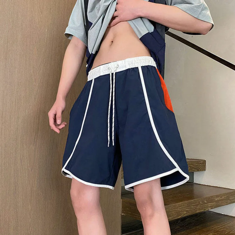 LUZHEN 2025 Estate Stripe Splicing Pantaloncini ad asciugatura rapida Sport Moda uomo Pantaloni casual larghi dritti Vita elastica Nuovo JY2893