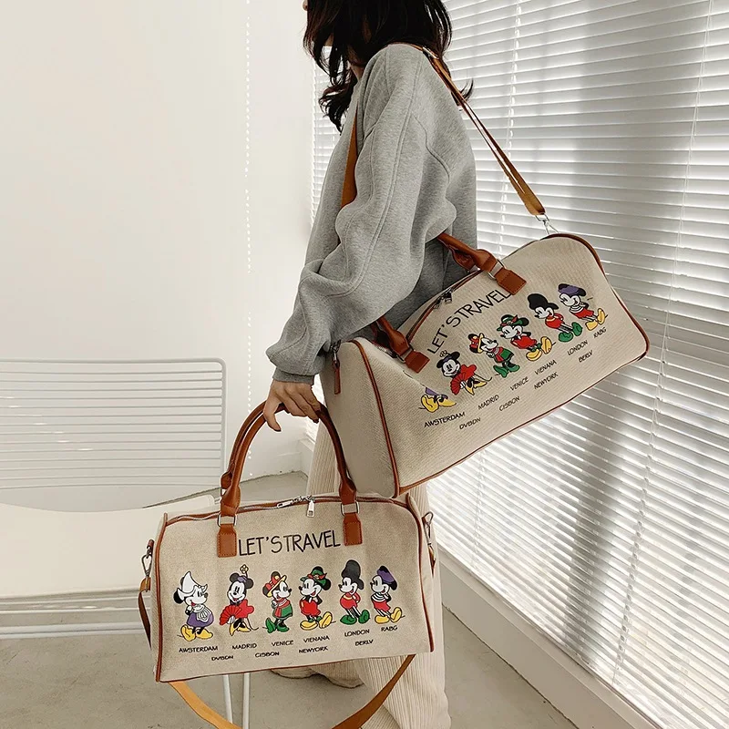 MINISO Mickey Mouse New Canvas Travel Bag Portable Storage Bag Cartoon Travel Bag Ladies Large Capacity Shoulder Bag Luxury Bag