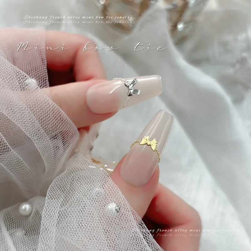 150-200PCS Gold Silber Metall Fliege Nail art Charms Mini Bowknot Nieten Zubehör Für Maniküre Nägel Dekoration liefert Werkzeug