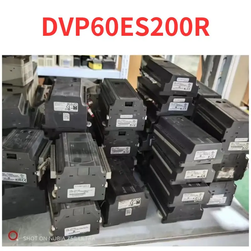 Second-hand  DVP60ES200R   PLC   test  OK     Fast Shipping