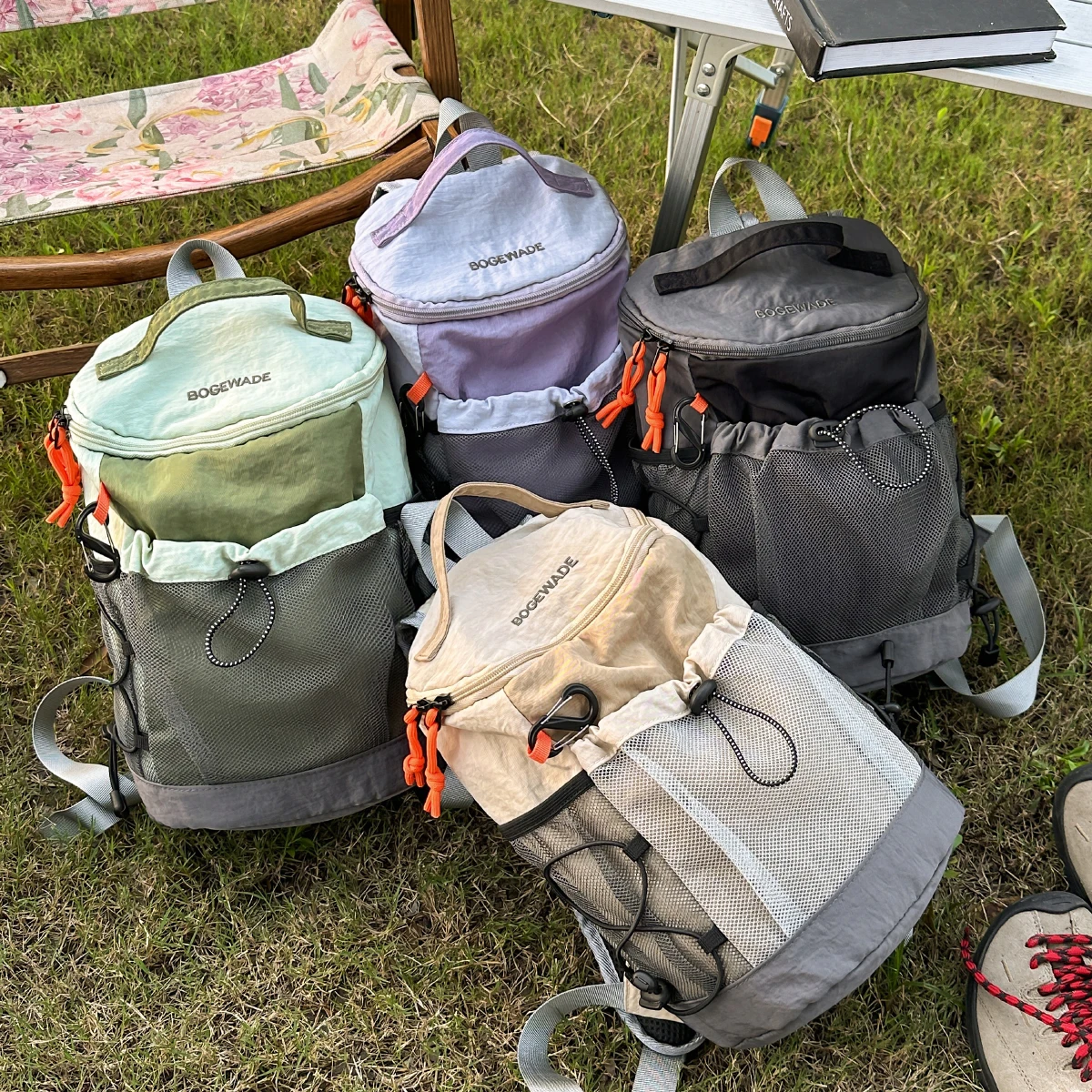 حقيبة الظهر النسائية 2025 حقيبة مدرسية جديدة الرياضة في الهواء الطلق المشي لمسافات طويلة على ظهره حقيبة تسلق الجبال لمسافات قصيرة حقيبة سفر حقيبة حاسوب الرجال الصيد وركوب الدراجات التصميم الأصلي الشعور