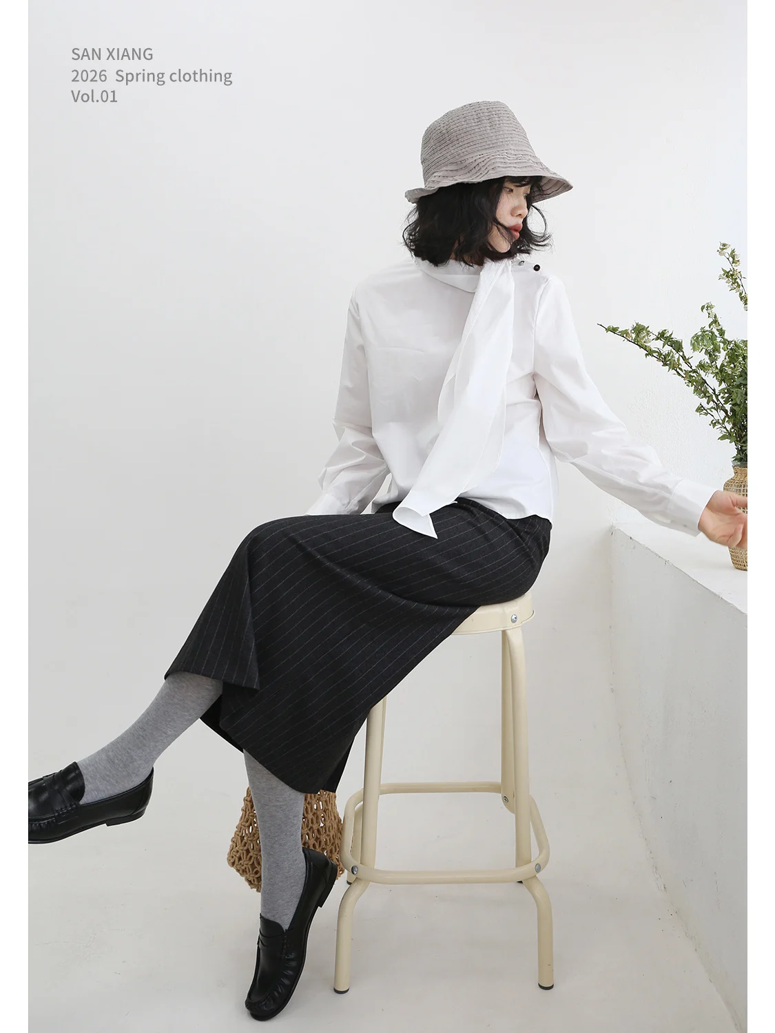 

High Waist Slim Fit Striped Midi Skirt for Women Spring 2026 Fashion Versatile Straight Cut Asymmetrical Hemline Polyester Blend