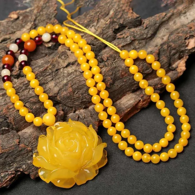 

Ожерелье в виде длинной цепи с куриным маслом желтого пчелиного воска