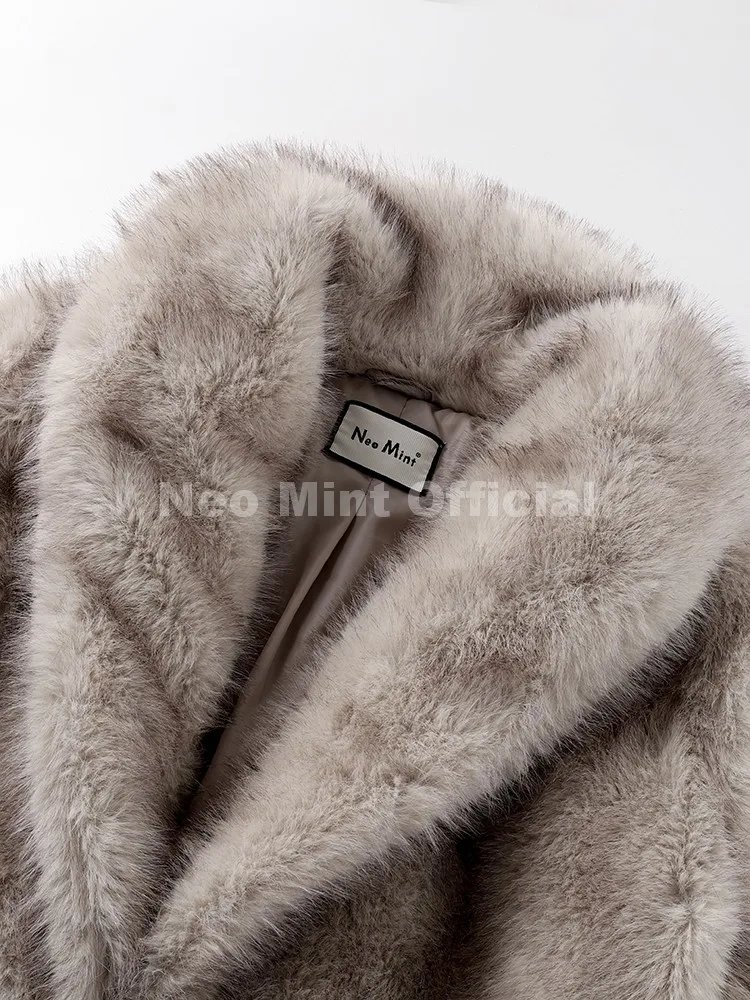 เสื้อโค้ทขนเฟอร์เทียมสีมิ้นท์นีโอ ยาว สำหรับผู้หญิง ฤดูหนาว 2025 ขนฟูไล่เฉดสี ขนฟ็อกซ์แบบเป็นมิตรต่อสิ่งแวดล้อม แจ็คเก็ตหรูหรา สไตล์ Mob Wife  เสื้อคลุมขนเฟอร์สวยงาม