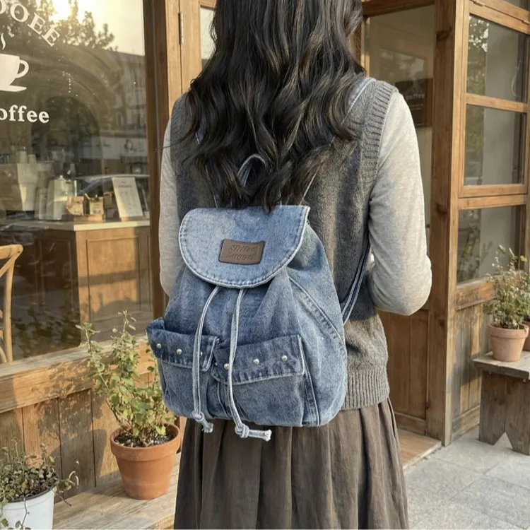Retro washed denim drawstring single shoulder backpack for women, trendy and cool, versatile commuting backpack