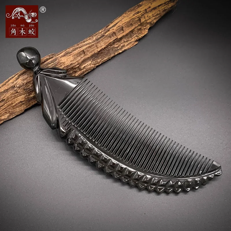 

Carved corn comb made from buffalo horn