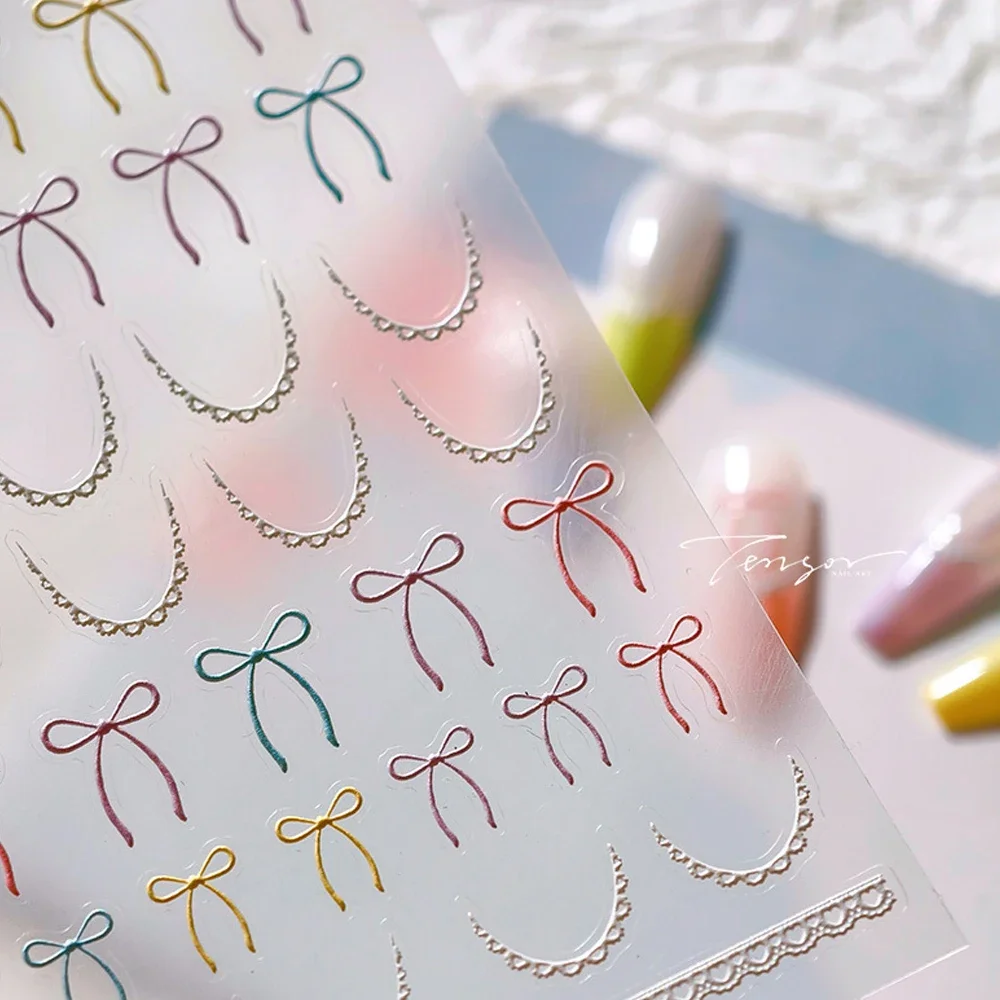 素敵な 5D ちょう結びネクタイリボンネイルアートステッカーパールカラフルなレースパールコーディングマカロンカラーシルク自己粘着マニキュアデカール