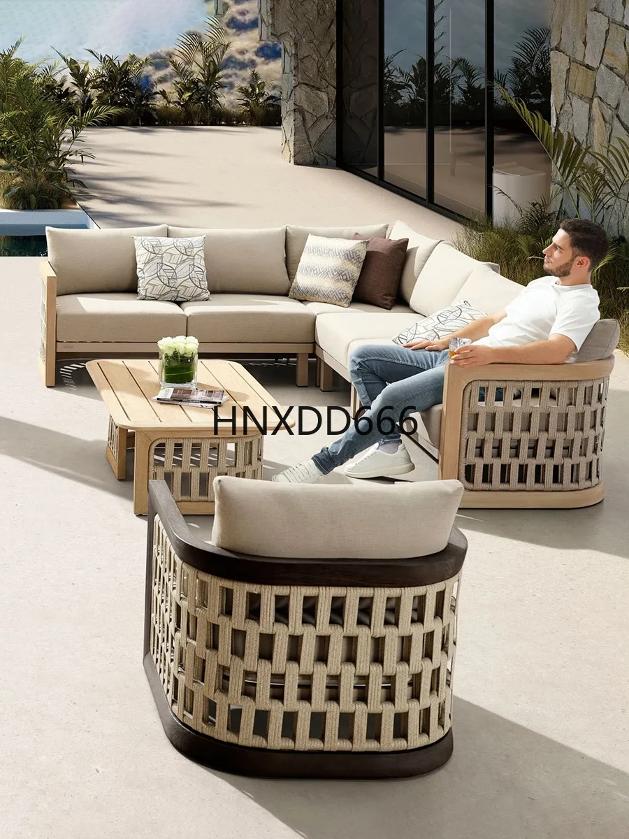 Sofá de exterior, mesa de centro de ratán con patio de teca