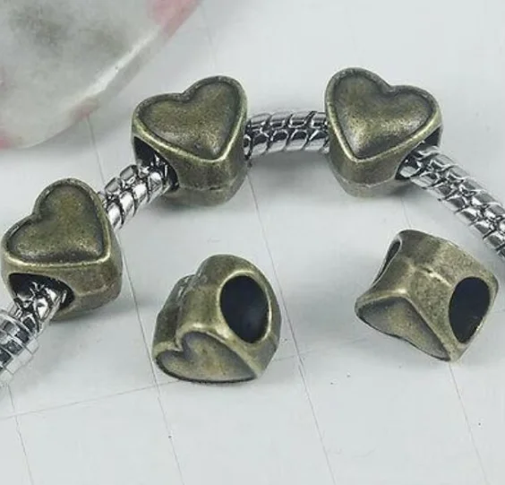 

10pcs 8x7mm,hole:4mm antiqued bronze 2sided heart shaped spacer beads HWL0181