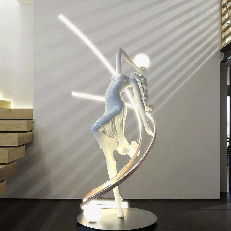 Modern creative dancing in the light, figure luminous lighting, floor-to-ceiling sculpture ornament in the hall