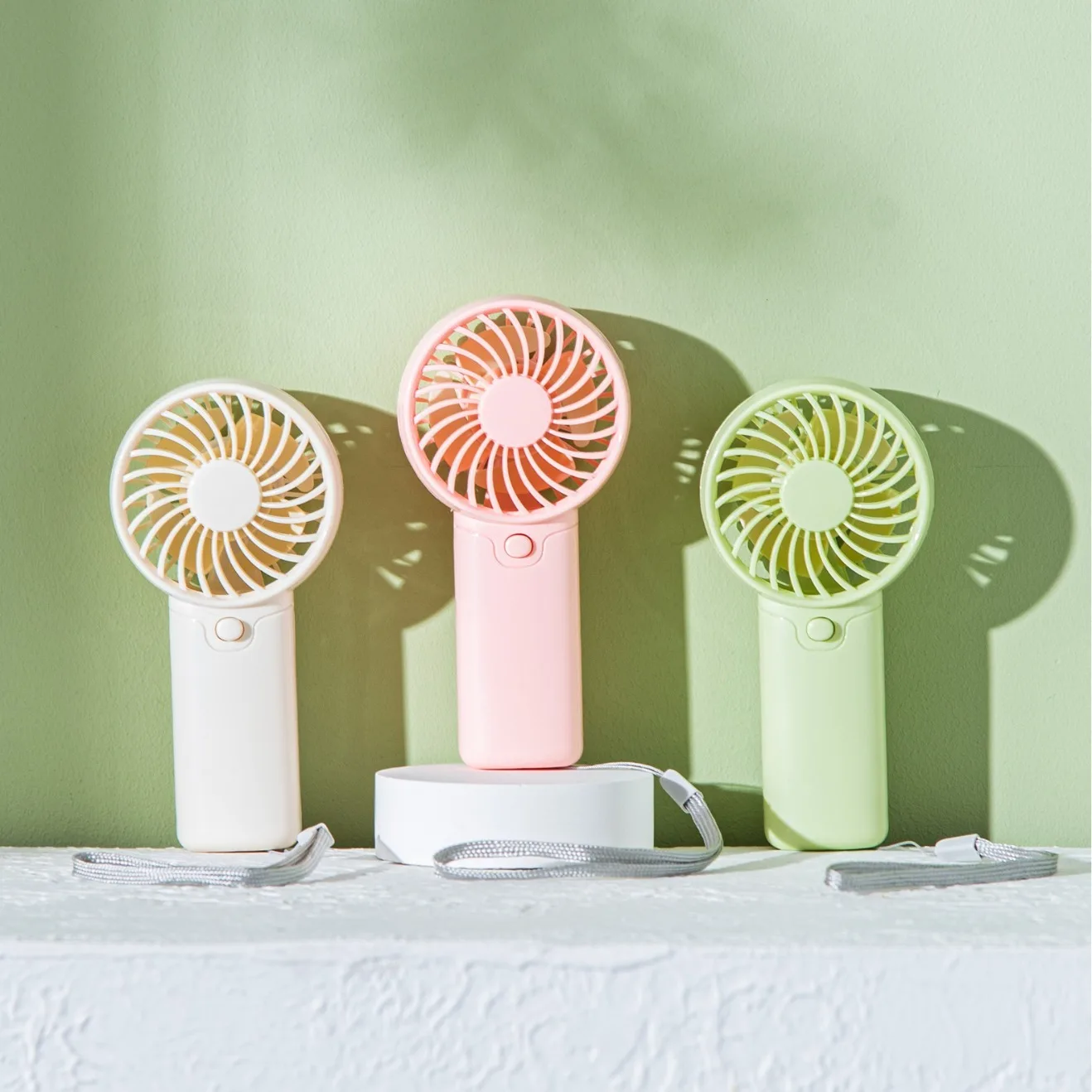 Multi-Color Compact Handheld Fan with Quiet Operation Portable Design and One-Touch Control for Home Office and Travel Available