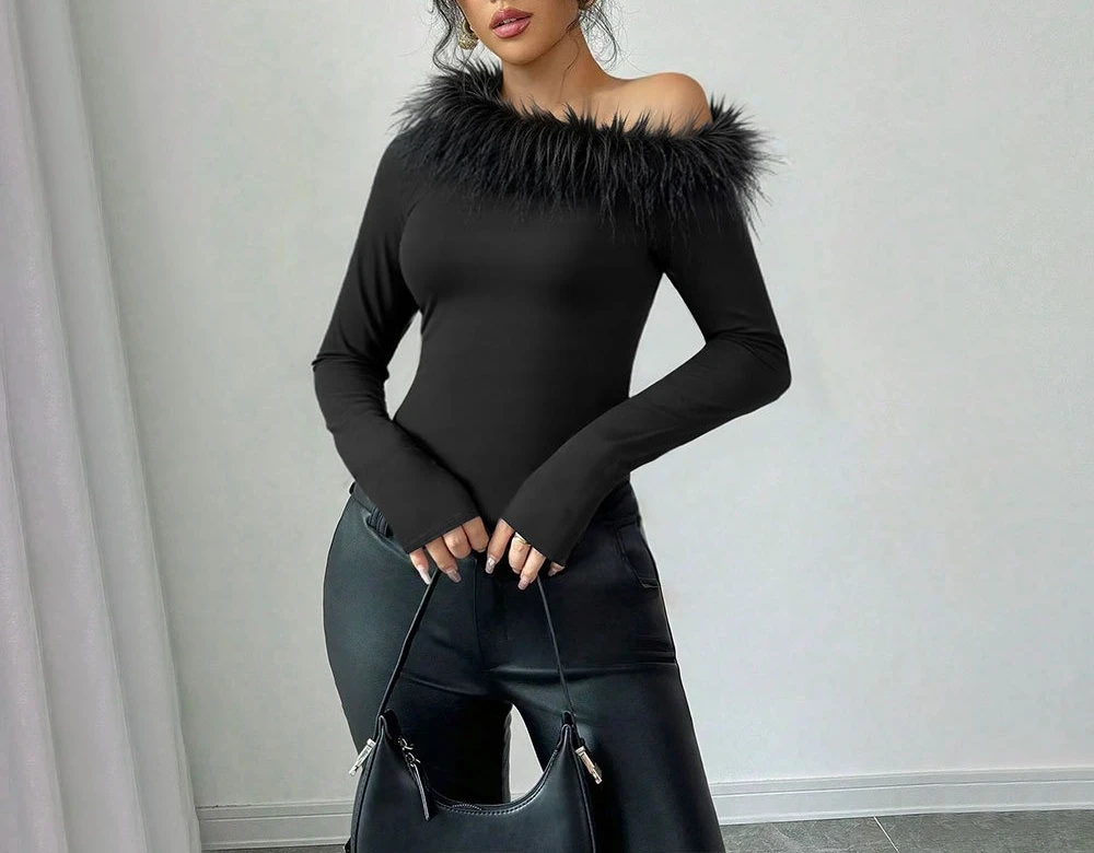Otoño e Invierno diseño de nicho empalme de plumas un solo hombro dobladillo Irregular ajustado Top de manga larga Mujer