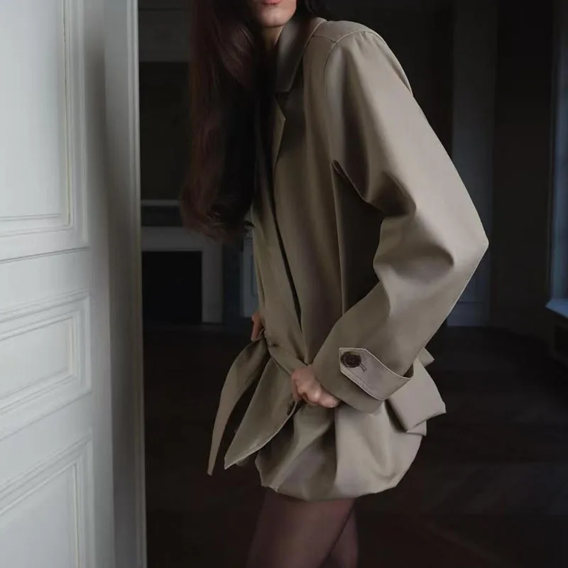 

Women's short trench coat with a ruffled hem and tie-front detail, lapel-collar double-breasted jacket, high quality, 2026, y2k