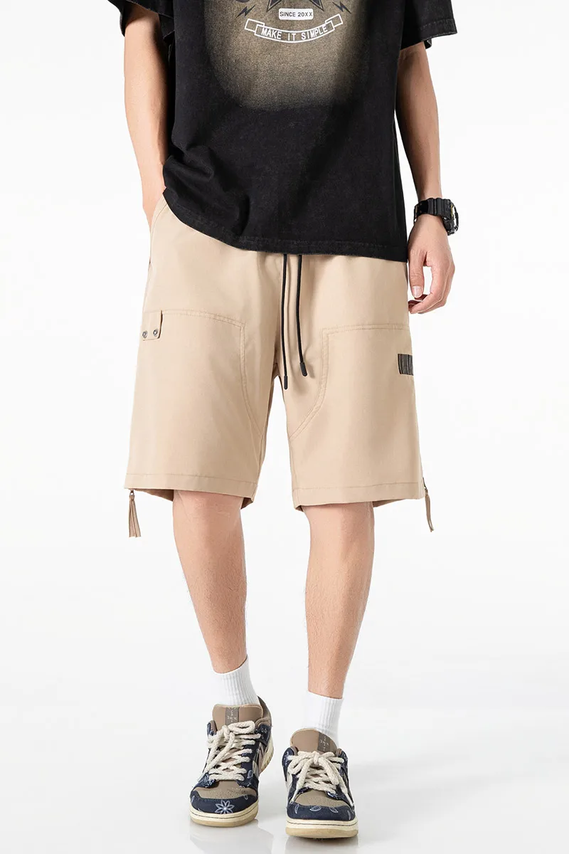 Celana pendek warna solid pria dengan desain ritsleting samping, celana pendek serut elastis kasual, pinggang longgar dan bernapas, spo cepat kering