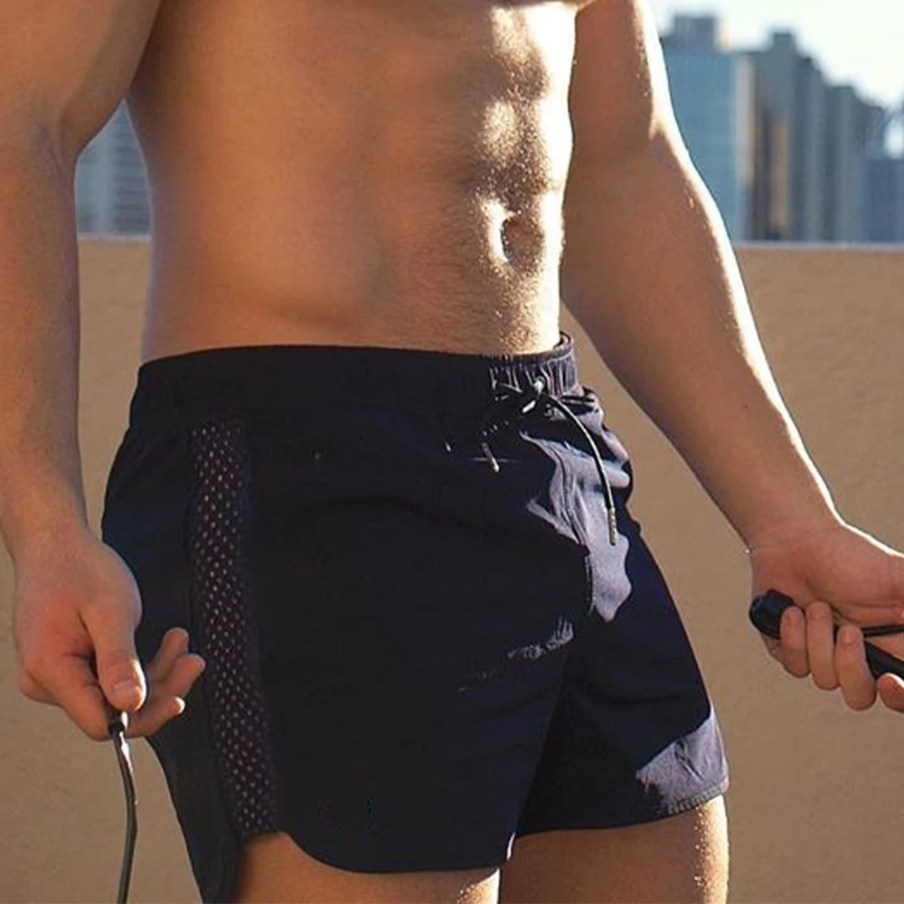 Shorts aumentam seu desempenho com nossas shorts de malha fitness masculinos para corrida e treinamento de secagem rápida e respiráveis