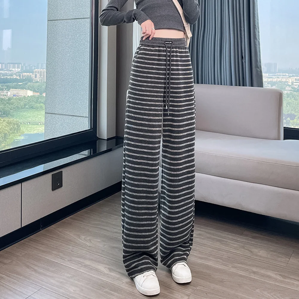 กางเกงขายาวผู้หญิงไซส์ใหญ่ ทรงหลวม สไตล์ลำลอง ลายทาง ขากว้าง ทรงตรง ใส่สบาย เหมาะกับฤดูใบไม้ผลิและฤดูใบไม้ร่วง ปี 2025