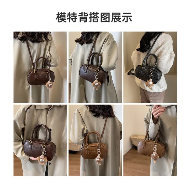 

Small niche retro hand-held pillow bag for women 2025 new versatile, fashionable and high-end single shoulder crossbody bag