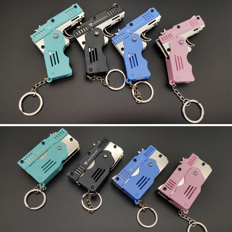 1PCS Mini Keychain Gun Rubber Band Gun Toy Shooting Pistol Alloy Rubber Band Pistol Kids Outdoor Party Folding Metal Gun Gifts