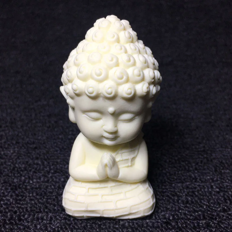 

Ivory Nut CarvingQVersion of Taolai Xiaomeng Buddha8.5*4.5*4.5cmBodhi Seeds Home Desktop Crafts Ornaments