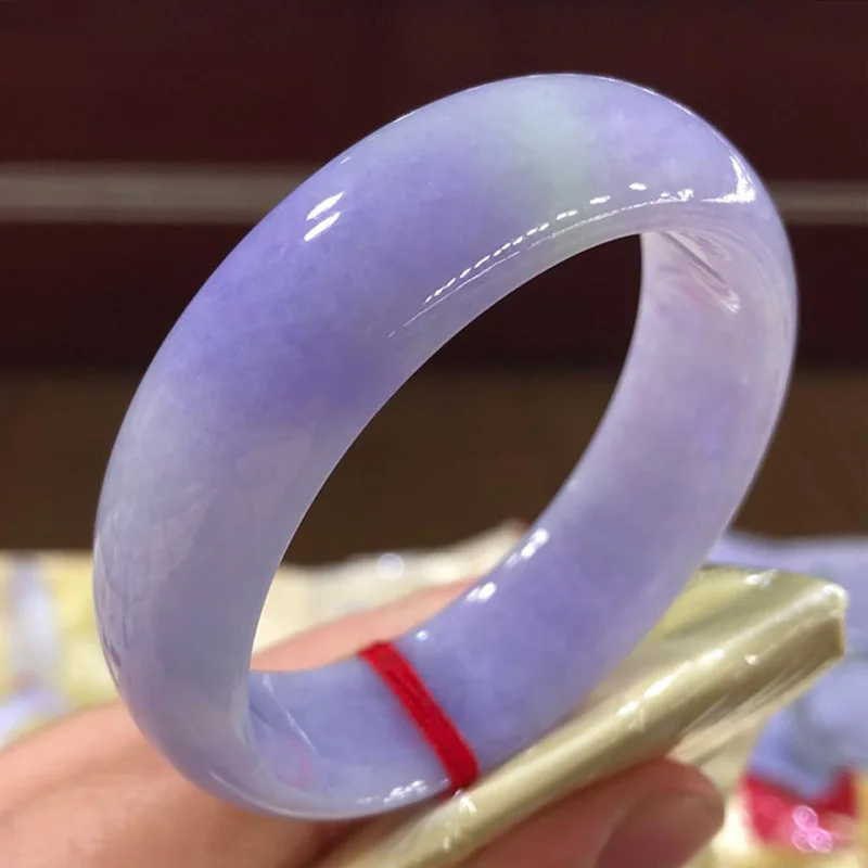 Natural Burmese A-grade jadeite wide bracele featuring an -like texture ice purple and spring-colored hues suitable for
