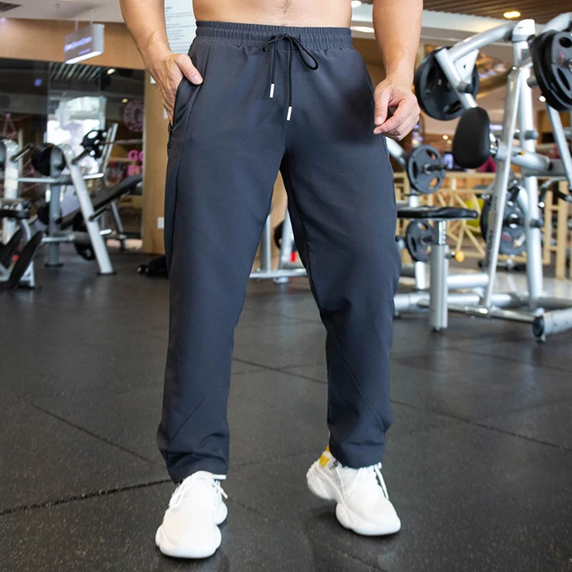 Pantalones de correr para hombre Pantalon elastico suelto recto para entrenamiento Fitness con cremallera y bolsillo impermeable para gimnasio al aire libre Otono e Invierno AliExpress