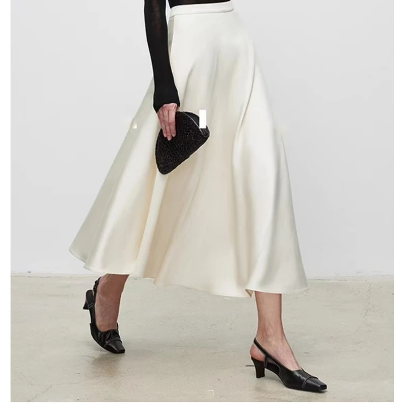 تنورة متوسطة الطول كلاسيكية على الطراز الأوروبي والأمريكي بعمر 25 عامًا بلون سادة معلقة بخصر عالٍ